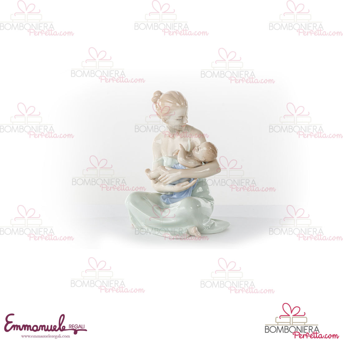 http://www.bombonieraperfetta.com/images/watermarked/1/detailed/18/D7193-Maternit%C3%A0-seduta-con-bimbo-morenadesign-bombonieraperfetta-emmanueleregali.jpg